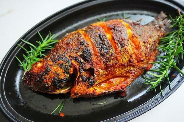 Grilled Tilapia with Jollof & Spicy Sauce